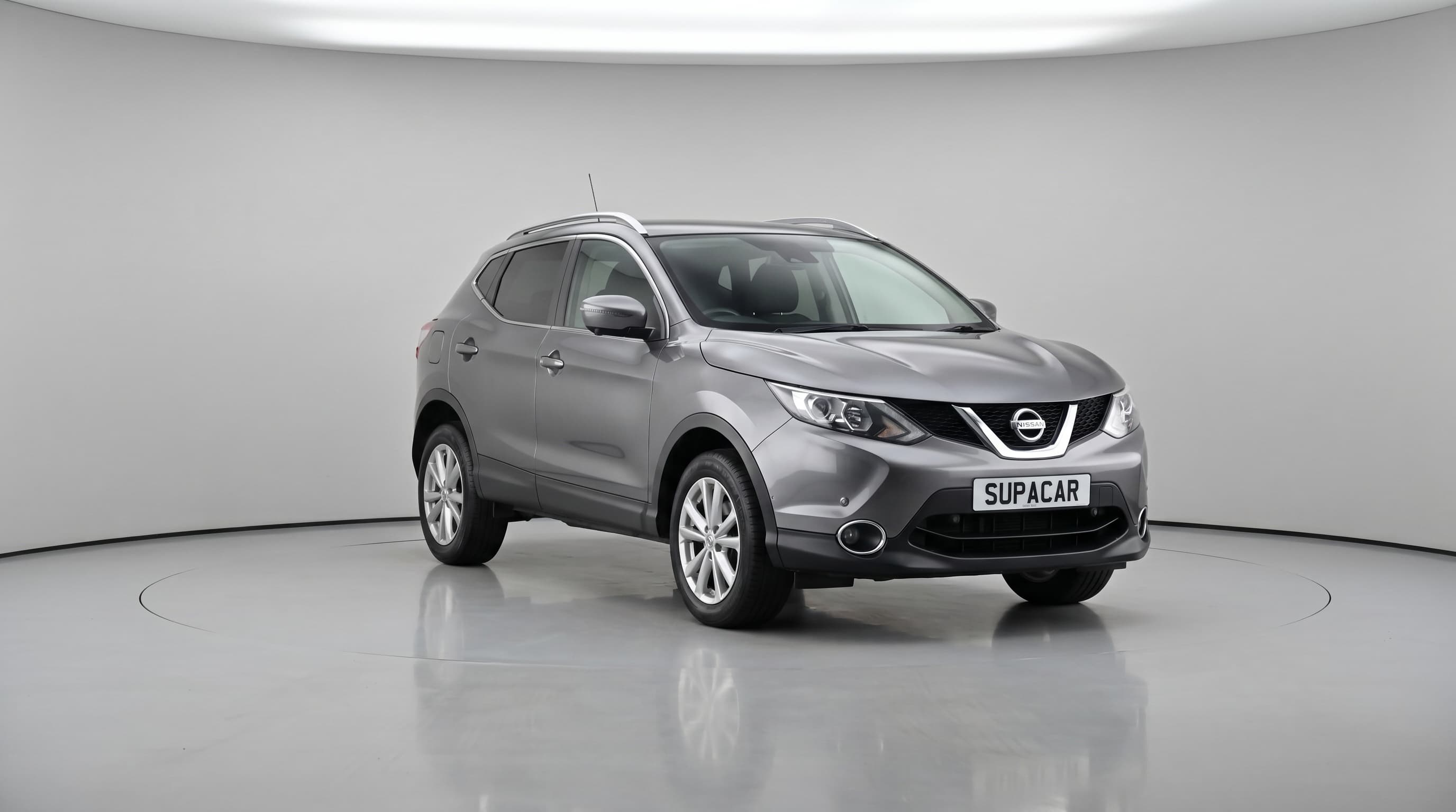 Car photographed in a bright studio scene